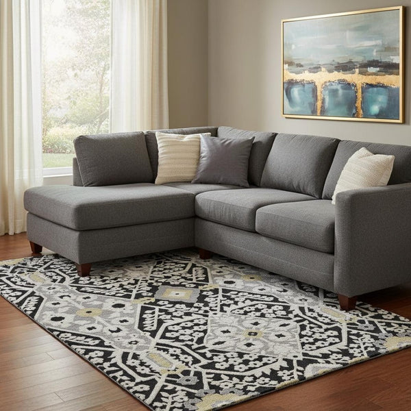 HomeRoots 10' X 14' Floral Area Rug in Black, Gray & Gold - Washable, UV Protected, Perfect for High-Traffic Areas 668489