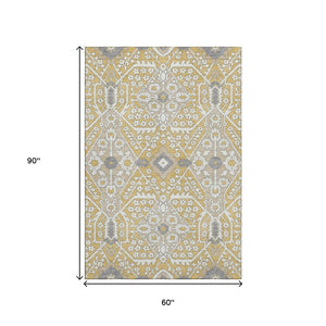 HomeRoots 5' X 8' Floral Washable Area Rug in Gold, Gray & Ivory - Durable, Stain-Resistant & UV Protected! 668503