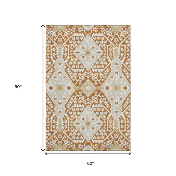 HomeRoots 5' X 8' Floral Area Rug in Rust, Beige & Gold - Washable, UV-Protected, Stylish & Durable Design 668557