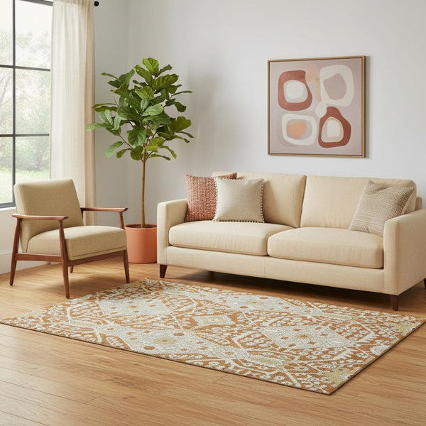 HomeRoots 5' X 8' Floral Area Rug in Rust, Beige & Gold - Washable, UV-Protected, Stylish & Durable Design 668557