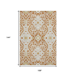 HomeRoots 9' X 12' Elegant Rust Beige and Gold Floral Washable Area Rug with Stain Resistance and UV Shield 668560