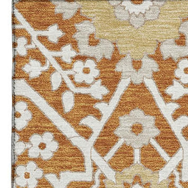 HomeRoots 9' X 12' Elegant Rust Beige and Gold Floral Washable Area Rug with Stain Resistance and UV Shield 668560