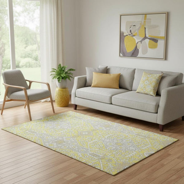 HomeRoots 5' X 8' Floral Washable Area Rug in Yellow Ivory & Beige – UV Protected, Stain Resistant, Durable Design 668587