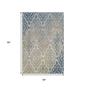 HomeRoots 5' X 8' Sky Blue Gold Ivory Medallion Area Rug – Washable, UV-Protected, Perfect for Busy Homes! 668605