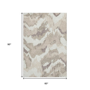 HomeRoots 5' X 8' Beige and Ivory Abstract Washable Area Rug - UV Protected, Stylish, Durable, Easy Care Decor 668617