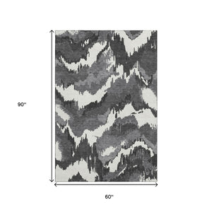 HomeRoots 5' X 8' Black And Ivory Abstract Washable Area Rug with UV Protection - Stylish, Durable, Easy Care! 668623