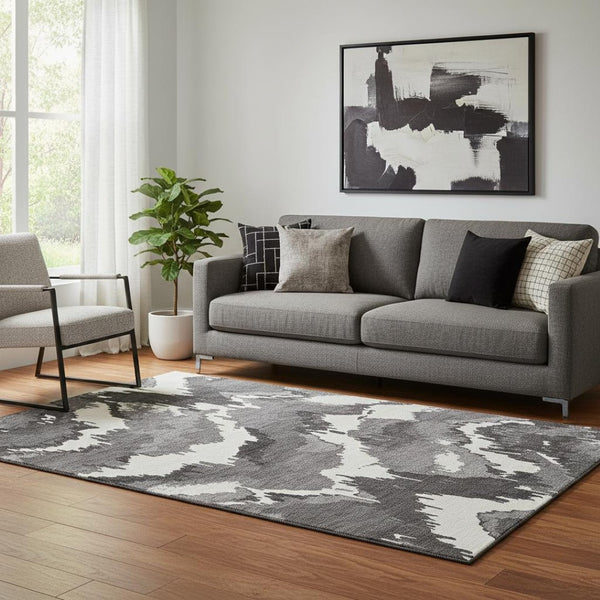 HomeRoots 5' X 8' Black And Ivory Abstract Washable Area Rug with UV Protection - Stylish, Durable, Easy Care! 668623