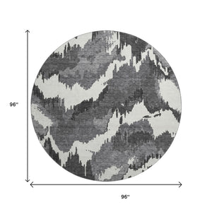 HomeRoots 8' Black And Ivory Abstract Round Rug - Stylish, Washable, UV-Protected for Busy Homes & Spaces 668624