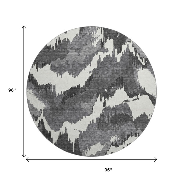 HomeRoots 8' Black And Ivory Abstract Round Rug - Stylish, Washable, UV-Protected for Busy Homes & Spaces 668624