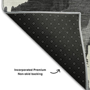 HomeRoots 8' X 10' Stylish Black and Ivory Abstract Washable Area Rug with UV Protection for Modern Living Spaces 668625