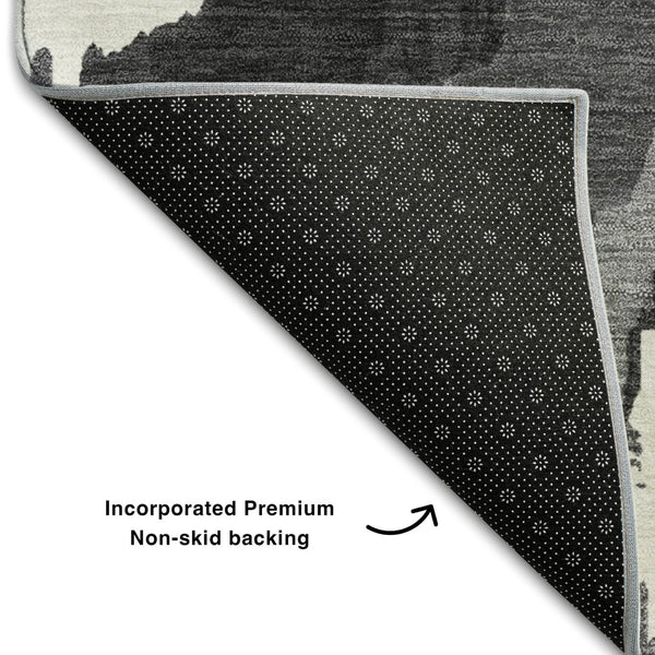 HomeRoots 8' X 10' Stylish Black and Ivory Abstract Washable Area Rug with UV Protection for Modern Living Spaces 668625