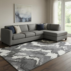 HomeRoots 9' X 12' Black And Ivory Abstract Area Rug - Durable, Washable, UV-Protected for Busy Homes & Pets 668626