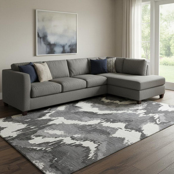 HomeRoots 9' X 12' Black And Ivory Abstract Area Rug - Durable, Washable, UV-Protected for Busy Homes & Pets 668626