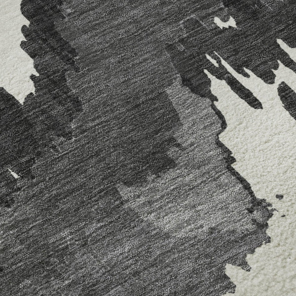 HomeRoots 9' X 12' Black And Ivory Abstract Area Rug - Durable, Washable, UV-Protected for Busy Homes & Pets 668626