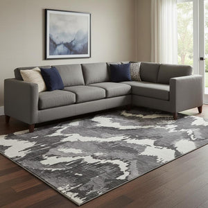 HomeRoots 10' X 14' Black And Ivory Abstract Area Rug - Washable, Durable, UV Protected for Stylish Living Spaces 668627