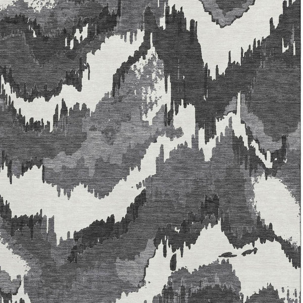 HomeRoots 10' X 14' Black And Ivory Abstract Area Rug - Washable, Durable, UV Protected for Stylish Living Spaces 668627