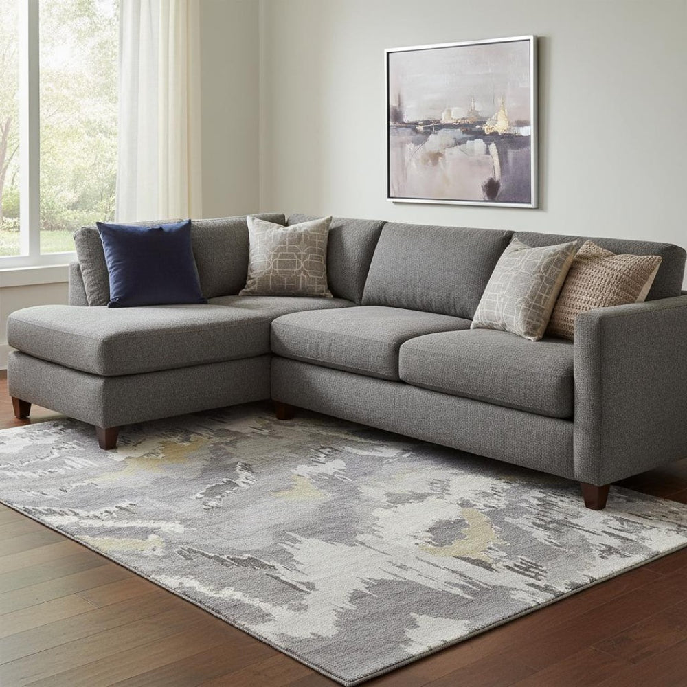 HomeRoots 9' X 12' Stylish Gray Gold Ivory Abstract Washable Area Rug with UV Protection & Stain Resistance 668656