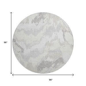HomeRoots 8' Ivory and Beige Abstract Round Rug – Washable, UV Protected, Durable & Stylish for Any Room 668666