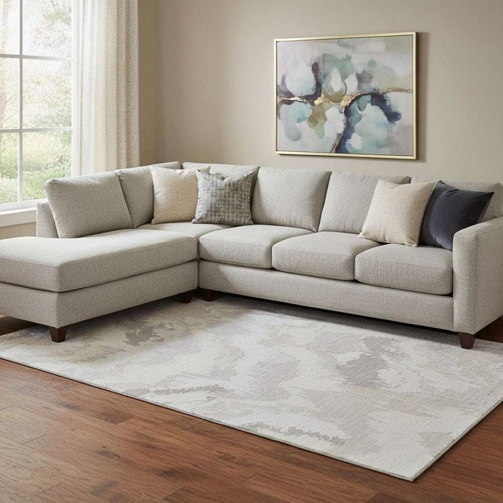 HomeRoots 10' X 14' Ivory and Beige Abstract Washable Area Rug - UV Protected, Soft, Stylish, Family-Friendly 668669