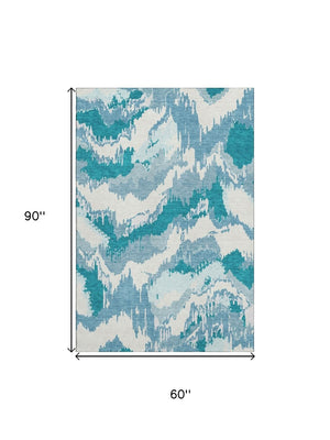 HomeRoots 5' X 8' Teal and Ivory Abstract Washable Area Rug – Durable, Stylish, Stain-Resistant, UV Protected! 668689