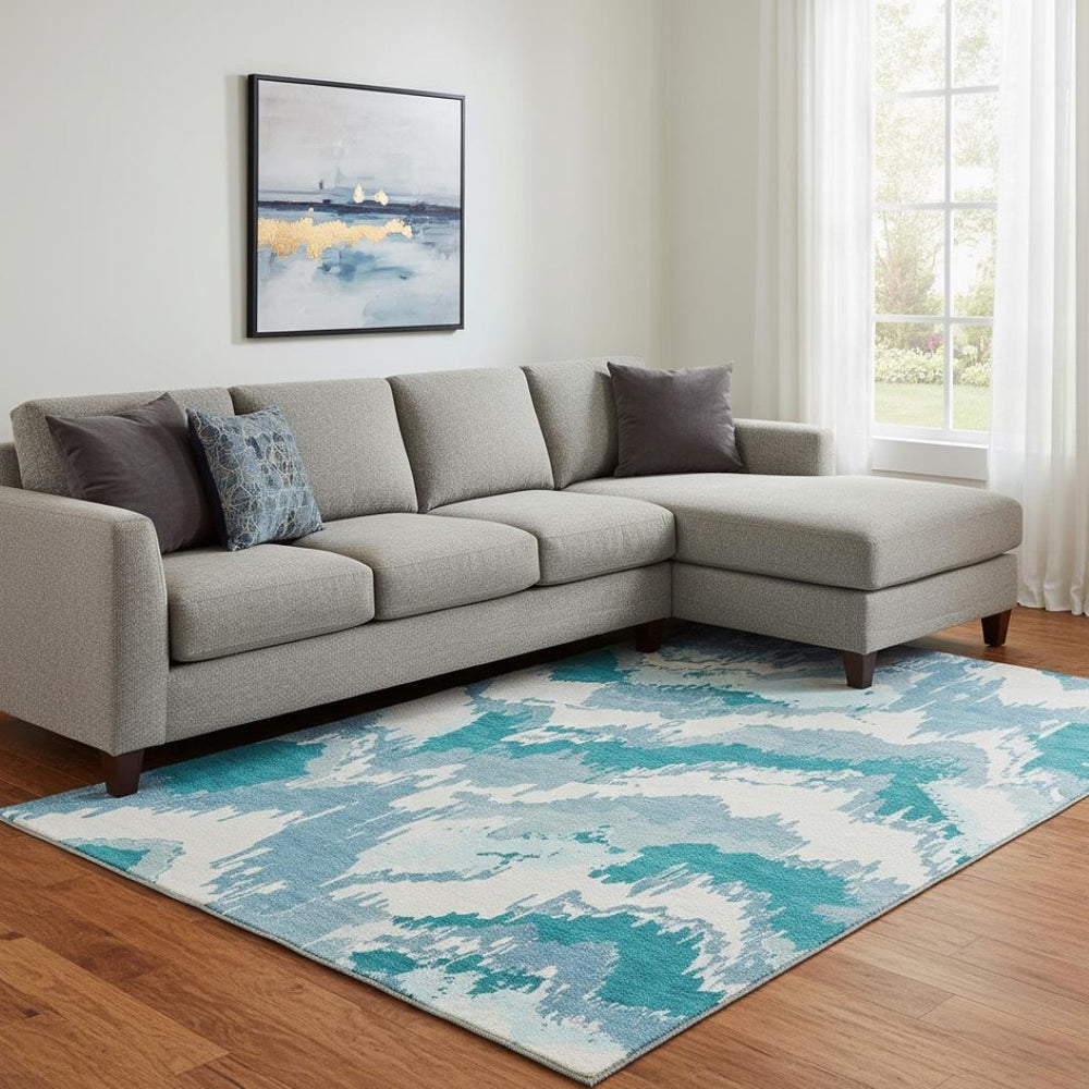 HomeRoots 8' X 10' Teal and Ivory Abstract Washable Area Rug with UV Protection for Modern Living Spaces 668691