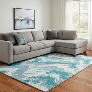HomeRoots 10' X 14' Teal & Ivory Abstract Area Rug - Washable, UV-Protected, Durable Design for High-Traffic Spaces 668693