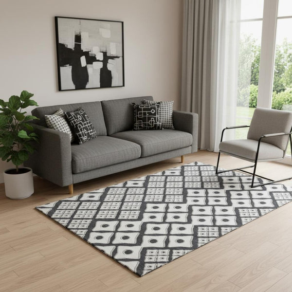 HomeRoots 5' X 8' Washable Black And Ivory Geometric Area Rug with UV Protection for High-Traffic Spaces 668708