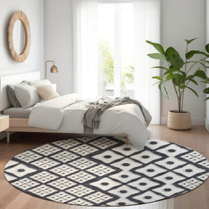 HomeRoots 8' Black And Ivory Geometric Round Rug - Washable, UV-Protected, Durable for High-Traffic Areas 668709