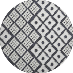 HomeRoots 8' Black And Ivory Geometric Round Rug - Washable, UV-Protected, Durable for High-Traffic Areas 668709