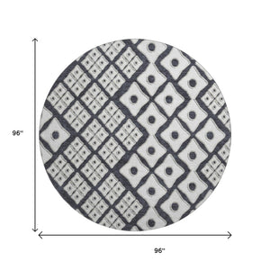 HomeRoots 8' Black And Ivory Geometric Round Rug - Washable, UV-Protected, Durable for High-Traffic Areas 668709