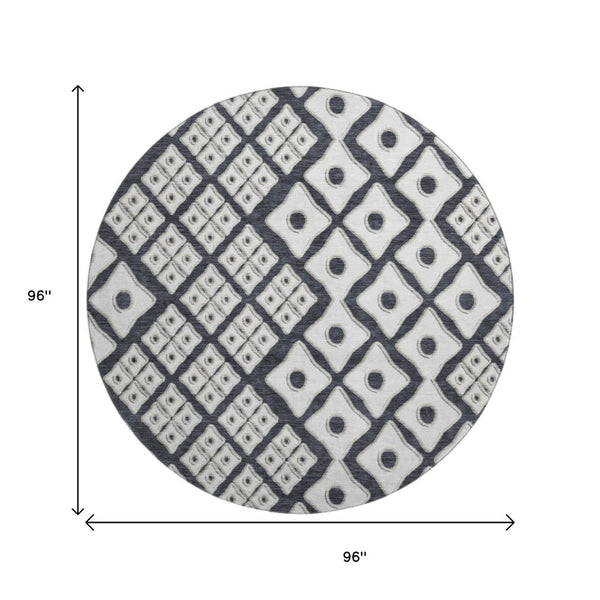 HomeRoots 8' Black And Ivory Geometric Round Rug - Washable, UV-Protected, Durable for High-Traffic Areas 668709