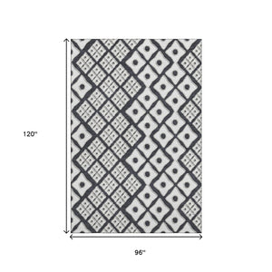 HomeRoots 8' X 10' Black and Ivory Geometric Area Rug – Durable, Stain-Resistant, UV Protected for High-Traffic Homes 668710