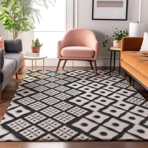 HomeRoots 9' X 12' Black And Ivory Geometric Area Rug - Stylish, Washable, UV-Protected for High-Traffic Spaces 668711