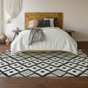 HomeRoots 9' X 12' Black And Ivory Geometric Area Rug - Stylish, Washable, UV-Protected for High-Traffic Spaces 668711