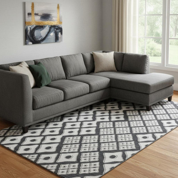 HomeRoots 9' X 12' Black And Ivory Geometric Area Rug - Stylish, Washable, UV-Protected for High-Traffic Spaces 668711