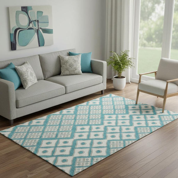 HomeRoots 5' X 8' Teal and Ivory Geometric Area Rug – Washable, UV-Protected, Ideal for High-Traffic Spaces 668762