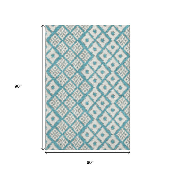 HomeRoots 5' X 8' Teal and Ivory Geometric Area Rug – Washable, UV-Protected, Ideal for High-Traffic Spaces 668762