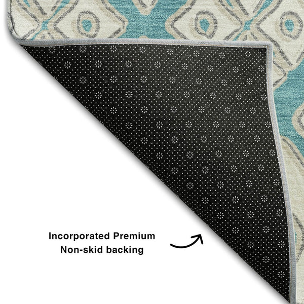 HomeRoots 8' Teal And Ivory Geometric Round Rug - Washable, UV Protected, Durable, Perfect for High-Traffic Spaces 668763