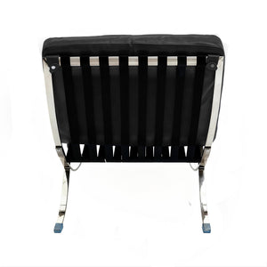 HomeRoots 29" Modern Folding Lounge Chair in Black and Silver - Genuine Leather, Tufted Design, Compact Comfort 668906