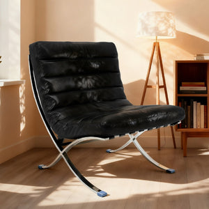HomeRoots 29" Modern Folding Lounge Chair in Black and Silver - Genuine Leather, Tufted Design, Compact Comfort 668906