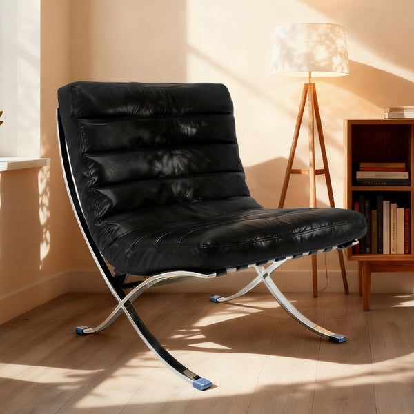 HomeRoots 29" Modern Folding Lounge Chair in Black and Silver - Genuine Leather, Tufted Design, Compact Comfort 668906