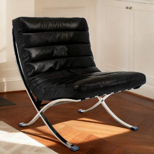HomeRoots 29" Modern Folding Lounge Chair in Black and Silver - Genuine Leather, Tufted Design, Compact Comfort 668906