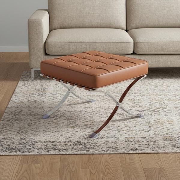 HomeRoots 20" Amber Leather Tufted Ottoman with Silver X-Base – Versatile Accent for Modern Living Spaces 668911