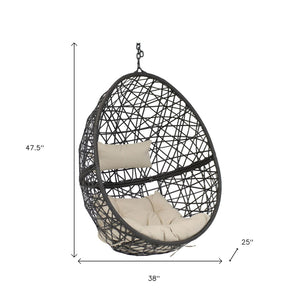 HomeRoots 38" Beige Steel Outdoor Egg Chair - Cozy Curved Seating with Removable Cushions for Patio Relaxation 668923