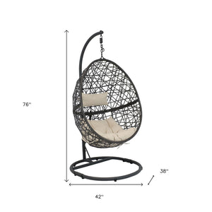 HomeRoots 42" Beige Egg Chair - Stylish Steel Frame & Weather-Resistant Wicker for Indoor/Outdoor Comfort & Relaxation 668929