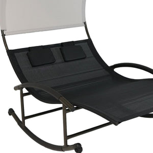 HomeRoots 70" Black Steel Sling Rocking Chaise Lounge with Adjustable Canopy for Ultimate Outdoor Comfort 668931