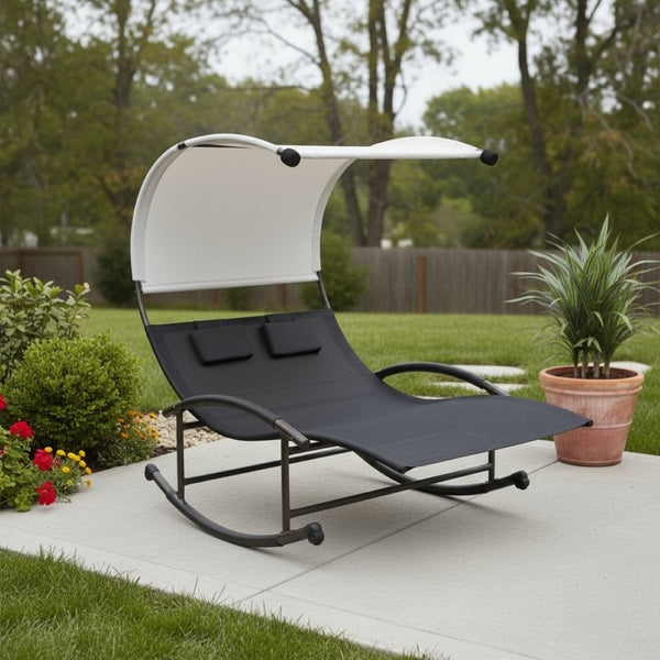 HomeRoots 70" Black Steel Sling Rocking Chaise Lounge with Adjustable Canopy for Ultimate Outdoor Comfort 668931