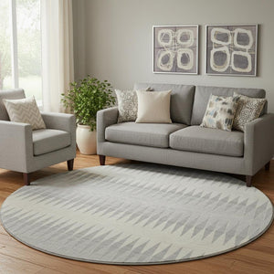 HomeRoots 8' Silver Ivory and Gray Striped Round Rug - Washable, UV Protected, Stain-Resistant, Modern Elegance 668997