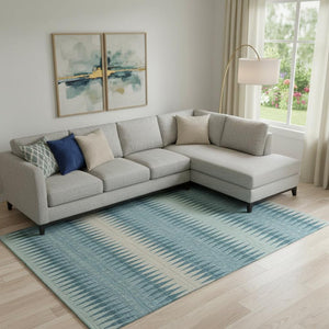HomeRoots 9' X 12' Striped Teal and Beige Washable Area Rug with UV Protection for High-Traffic Spaces 669011