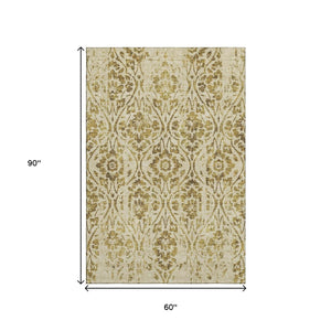 HomeRoots 5' X 8' Elegant Gold and Beige Floral Area Rug - Washable, UV-Protected for Stylish Durability 669044